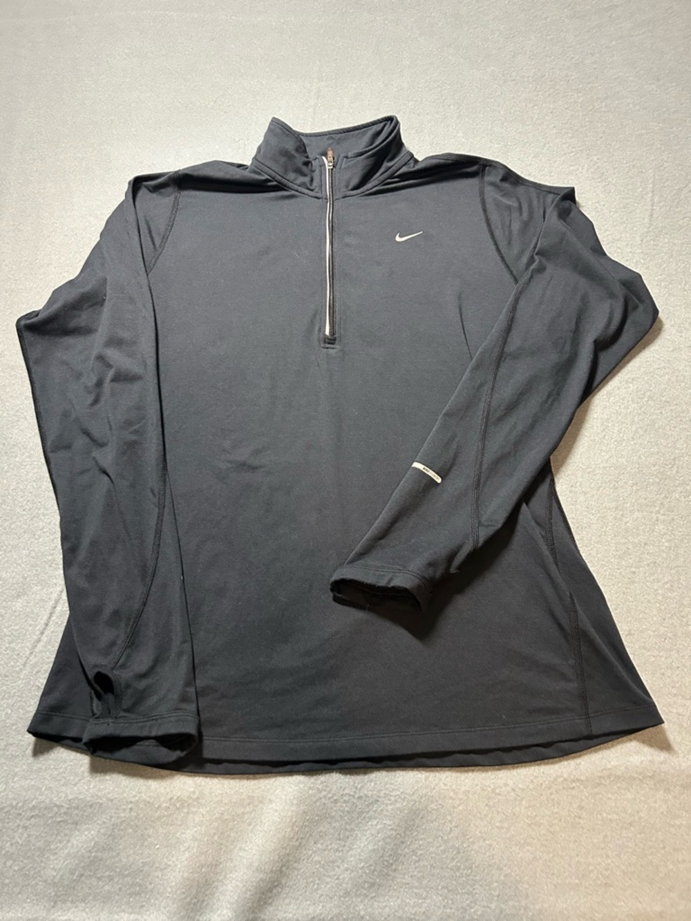 Women’s Nike Black Dri-FIT Running 1/4 zip activewear with White Logo